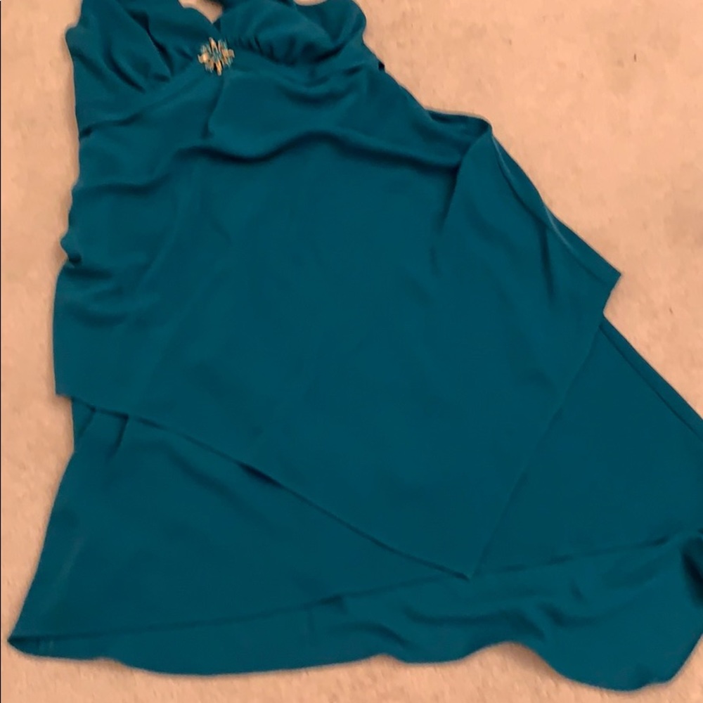 Halter cocktail dress. Asymmetrical bottom.